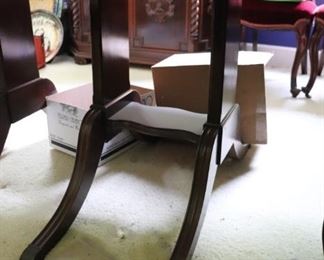 Legs of the dining room table that seats 10