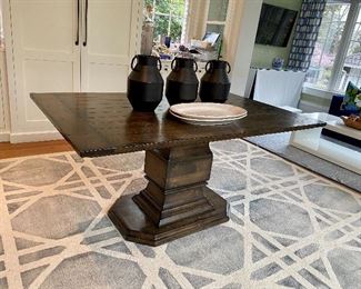 Rustic farmhouse pedestal table.