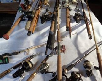 selection of rods and reels, including four telescoping rods and reels in foreground