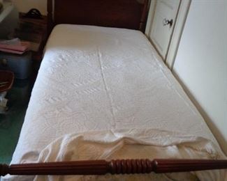 one of two twin beds