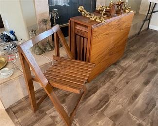 Mid-Century Romanian drop leaf table with stowaway chairs