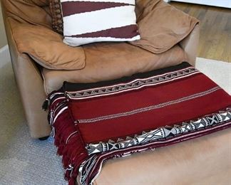 88. Leather chair and ottoman, throw/blanket, assorted decorative pillows