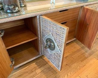 535. wicker and elephant sideboard has drawers and side storage!