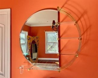 $250 - Art deco round mirror with shelves and built-in vase; 34" W x 32" H x 6.5" D 