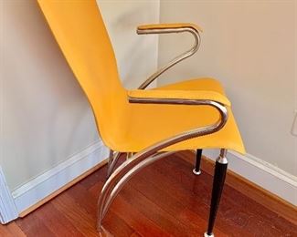 $175 - Yellow leather and metal contemporary chair; 36" H x 22.5" W x 16.5" D, seat height is approximately 17.5" 