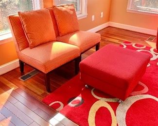 $300 - Pair of modern orange chairs with 20" pillows, upholstery fabric is poly canvas; 33.5" H x 24.5" W x 27" D, seat height is approximately 18"