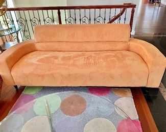 $450 - Orange microfiber sofa; 84" W x 33" H x 30" D, seat height is approximately 16"