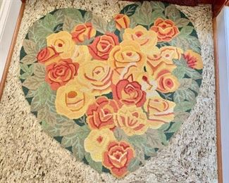 $45 - Heart shaped rug; 30" x 31"