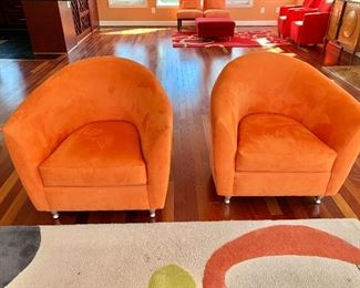 $395 - Pair of bright orange chairs - 33" H x 33" W x 31" D, seat height is approximately 17"  