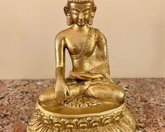 $20 - Gold painted ceramic Buddha; 7.5" x 6.5" W