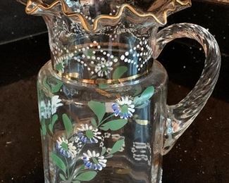 $20 - Handpainted glass pitcher with gold ruffle trim, some wear to gold finish; 10" H x 6.5" W 