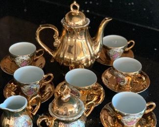 $45 - Ozone China tea service with teapot (8" H) and six demitasse size teacups and six saucers, creamer, and sugar bowl