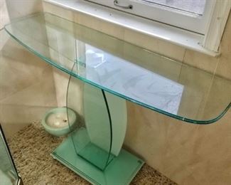 $425 - Contemporary glass console table. 30 in. H x 45 in. L x 14 in. depth.
