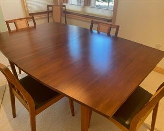Table 64" x 42", 28 1/2" tall, includes 2 20" Leaves, Pads for all and 6 Chairs (S114)