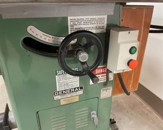 Close up: General 10" Tilting Arbor Saw with Base on Wheels and Saw Blades (S368)