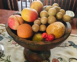 Antique painted wooden compote full of stone fruit