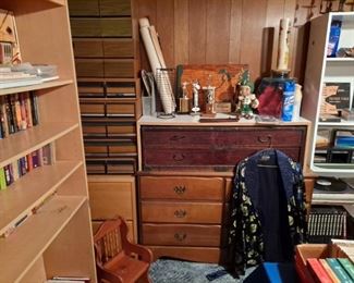 3 drawer chest; 2 drawer chest; child's chair; trophies; Jenison figurine; large assortment of video storage cases.