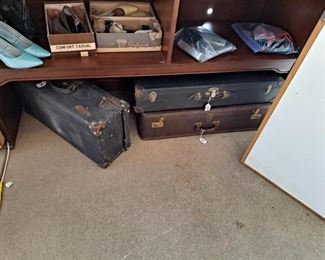 Vintage suitcases; vintage ladies shoes in boxes