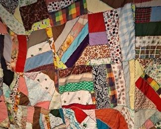 Hand made vintage quilt with crazy quilt stitching or chicken scratch