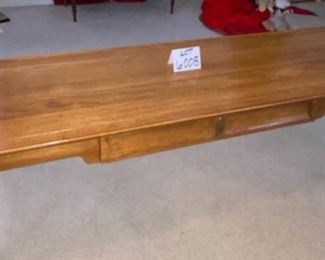 Lot 6008. $175.00. Mid Century Modern Coffee Table by Heritage, done in Oak Plank Style with drawer underneath. Measures 62" x 19" x 16" tall. Great condition. Super nice piece!