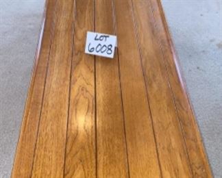 Lot 6008. $175.00. Mid Century Modern Coffee Table by Heritage Furniture, done in Oak Plank Style with drawer underneath. Measures 62" x 19" x 16" tall. Great condition. Super nice piece!
