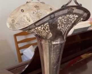 Lot 6011. $650.00. Amazing Antique Sterling Silver Bridal Basket - Filigree top, etched design base, and handle. The Basket part and base has a reticulated and an etched design 20x10" x 8" deep. Absolutely Stunning! Marked A10846, the mark could be Gorham. The piece weighs approximately 21 ounces. We are selling this for its aesthetic value, rather than simply melt-down.