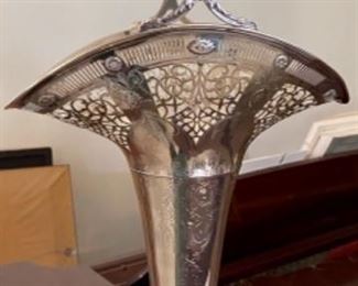 Lot 6011. $650.00. Amazing Antique Sterling Silver Bridal Basket - Filigree top, etched design base, and handle. The Basket part and base has a reticulated and an etched design 20x10" x 8" deep. Absolutely Stunning! Marked A10846, the mark could be Gorham. The piece weighs approximately 21 ounces. We are selling this for its aesthetic value, rather than simply melt-down.