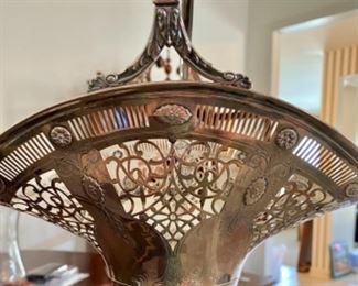 Lot 6011. $650.00. Amazing Antique Sterling Silver Bridal Basket - Filigree top, etched design base, and handle. The Basket part and base has a reticulated and an etched design 20x10" x 8" deep. Absolutely Stunning! Marked A10846, the mark could be Gorham. The piece weighs approximately 21 ounces. We are selling this for its aesthetic value, rather than simply melt-down.