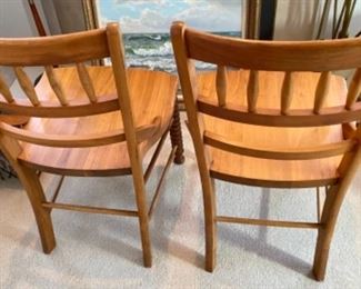 Lot 6015. $200.00. Two of the most lovely chairs with turned front legs - They are side chairs but are such a combination of form and function that it defies description. #27339-2, measure 19"w x 20"d x 32" seat height. These are on my top 10 list of the sale, too. How do you wonder? They are just wooden chairs, but I've never sat on a more comfortable chair with such great looks and craftsmanship. They had to be hand-made but no markings.