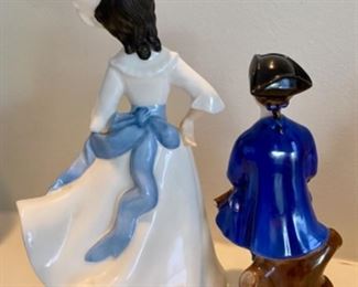 Lot 6020. $125.00. 4 Vintage Porcelain Figurines: F G Doughty Royal Worcester Fine Bone China, England, Grandmother's Dress #3081, Margaret HN 2397 Royal Doulton, 8" tall, from 1981, Boy From Williamsburg Royal Doulton RK2183, and Dinky Do #1678. Vintage Figurines.