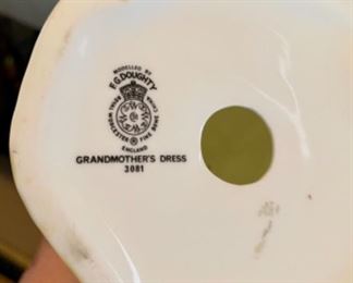 Lot 6020. $125.00. 4 Vintage Porcelain Figurines: F G Doughty Royal Worcester Fine Bone China, England, Grandmother's Dress #3081, Margaret HN 2397 Royal Doulton, 8" tall, from 1981, Boy From Williamsburg Royal Doulton RK2183, and Dinky Do #1678. Vintage Figurines.