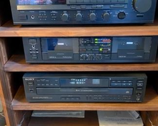 Lot 6025. $175.00 ( 0ver $360.00 if bought individually) 4 Tier Stereo Component Cabinet with Glass Doors ($110.00), 1988 Yamaha KX-W302U Double Cassette Deck (eBay 79.95 Sold Price) 1990 Yamaha RX-530 Natural Sound Stereo Receiver ($72.00 eBay Sold Price), Sony 5-Disc Player CDP-C545 ($75.00 eBay Sold Price), Pair of Boston A70 Speakers with Stands. ($30.00 eBay Sold Price)