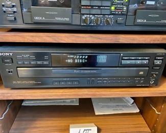 Lot 6025. $175.00 ( 0ver $360.00 if bought individually) 4 Tier Stereo Component Cabinet with Glass Doors ($110.00), 1988 Yamaha KX-W302U Double Cassette Deck (eBay 79.95 Sold Price) 1990 Yamaha RX-530 Natural Sound Stereo Receiver ($72.00 eBay Sold Price), Sony 5-Disc Player CDP-C545 ($75.00 eBay Sold Price), Pair of Boston A70 Speakers with Stands. ($30.00 eBay Sold Price)