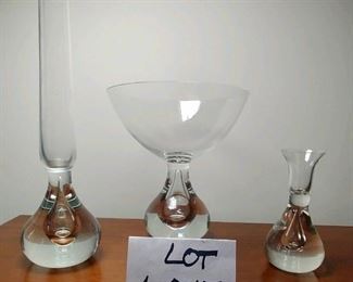 Lot 6017 $110.00. 3 unique pieces of signed hand-blown Mid Century Modern Bubble Based Crystal, tall narrow vase measures 14"t x 4" d x bowl 9"tall x 8.5" diameter and small bowl 7.5" diameter x 4" tall. The three pieces look like they may be Orrefors and signed by the artist.
