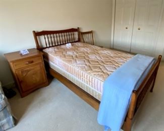 Lot 6036. $150.00. Pair of Twin Beds with spindle head and footboards and rails with mattresses and box springs. Headboards: 42"w x 38.5"t & Footboard: 42"w x 27.5"t. The matching bed is in storage in the basement and in great condition. Not sure about these mattresses - we did not test them out!
