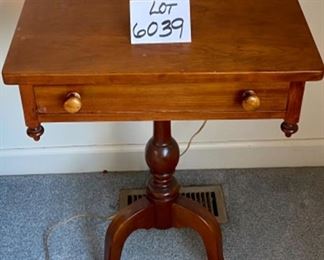 Lot 6039. $300.00. Vintage pair of side tables on a pedestal with one drawer. 3 legged pedestal with the the turned wood leg. The drawer is dovetailed. These two are just stunning, heirloom quality. 20"w x 16"d x 27.5"h