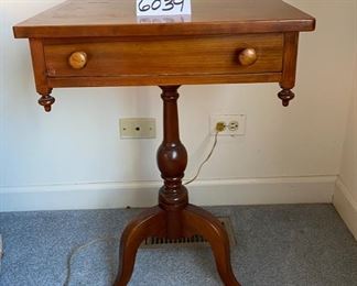Lot 6039. $300.00. Vintage pair of side tables on a pedestal with one drawer. 3 legged pedestal with the turned wood leg. The drawer is dovetailed. These two are just stunning, heirloom quality. 20"w x 16"d x 27.5"h
