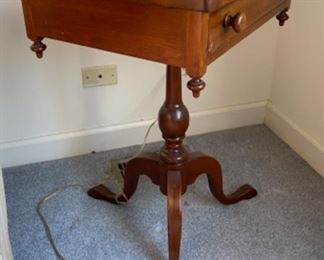 Lot 6039. $300.00. Vintage pair of side tables on a pedestal with one drawer. 3 legged pedestal with the turned wood leg. The drawer is dovetailed. These two are just stunning, heirloom quality. 20"w x 16"d x 27.5"h
