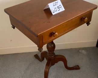 Lot 6039. $300.00. Vintage pair of side tables on a pedestal with one drawer. 3 legged pedestal with the turned wood leg. The drawer is dovetailed. These two are just stunning, heirloom quality. 20"w x 16"d x 27.5"h