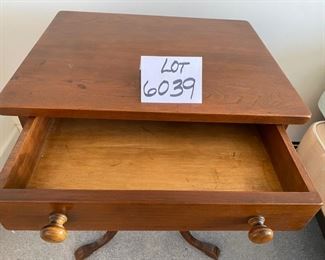 Lot 6039. $300.00. Vintage pair of side tables on a pedestal with one drawer. 3 legged pedestal with the turned wood leg. The drawer is dovetailed. These two are just stunning, heirloom quality. 20"w x 16"d x 27.5"h