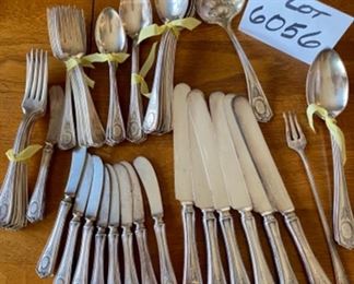 Lot 6056. $125.00. Set of Silver Plate Antique Flatware, monogrammed but it's anyone's guess as to what the letter is, lol - could be anything! Nice set of Community Silver - service for 6 plus extras, 6 dinner forks, 9 salad forks, 9 butter knives, 6 dinner knives, 6 teaspoons, 3 tablespoons, 6 soup spoons, 2 serving spoons, 1 ladle and one pickle fork, 49 pieces