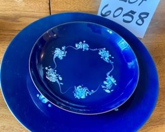 Lot 6058. $65.00. Leon Statham signed Enamel on Copper Mid Century Art Plates 2 Cobalt Blue, and made with design atop, Plates are 10" and 6-3/4" diameter, Fun to collect this MCM works of art - they look Danish Modern.