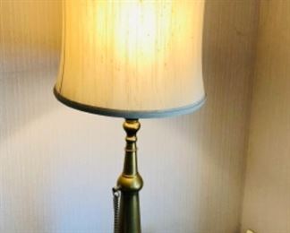 Lot 6073. $95.00. Mid Century Brass Table Lamp with Brass Chain Detail - Shade will need to be replaced. 43" tall 10" diameter base; Shade diam.15"