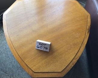 Lot 6074. $150.00. Heritage Side Table Rounded Tri "as is" with 2 shelves, Needs work - dog damage 29.5x 31" 23" tall. Good bones and worth painting or restoring.