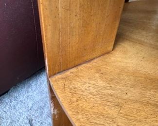 Lot 6074. $150.00. Heritage Side Table Rounded Tri "as is" with 2 shelves, Needs work - dog damage 29.5x 31" 23" tall. Good bones and worth painting or restoring.