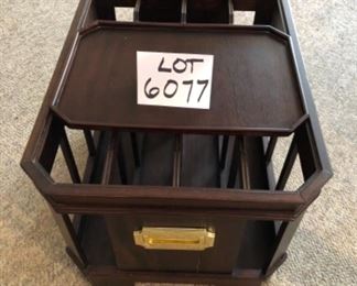 Lot 6077. $55.00 4 Section Magazine Rack with Moveable Convenience Tray, Brass Handle Detail. Measures 15"w x 19"deep x13" tall. Not branded. So handy, and the tray allows this to hold drinks, remotes, etc. while you pick your poison to read magazines, do your taxes, work from home, etc. Neat piece