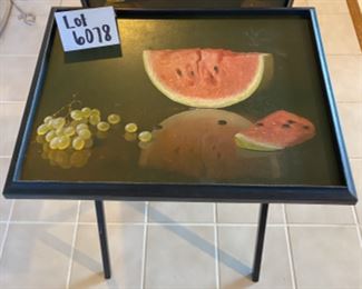 Lot 6078. $250.00. Set of 4 vintage tray tables from 1950's . Each tray has a different lacquered fruit design. Painted all black except the tray. By Artex Tables. c.
1950s MCM. Ok, gang - these are about the coolest TV tables we've ever seen - besides being works of art, they are clever anytime you need an extra table - use for puzzles, eating away from your table, helping organize your work from home mess, and more. Form & function, my mantra these days!