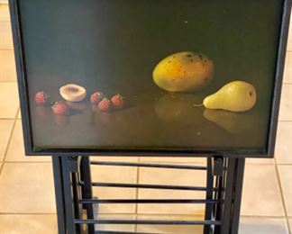 Lot 6078. $250.00. Set of 4 vintage tray tables from 1950's . Each tray has a different lacquered fruit design. Painted all black except the tray. By Artex Tables. c.
1950s MCM. Ok, gang - these are about the coolest TV tables we've ever seen - besides being works of art, they are clever anytime you need an extra table - use for puzzles, eating away from your table, helping organize your work from home mess, and more. Form & function, my mantra these days!