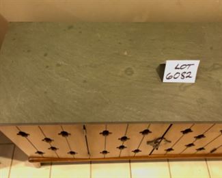 Lot 6082. $265.00 Media console Mid Century Bi-Fold doors with Keyhole Cut Outs. The top is a solid piece of slate that needs a good cleaning and sealing. 45"w x 15.5 deep x 25" high. This is a terrific credenza/console, with folding doors and a thousand uses, eclectic but with a definite Mid Century appeal.