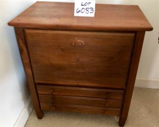 Lot 6083. $245.00 3-Drawer sheet music cabinet with compartment for recorder. Cabinet with drop door and slide out shelf on glides, 3 drawers w/knob 25.5" x17"deep x 26" tall